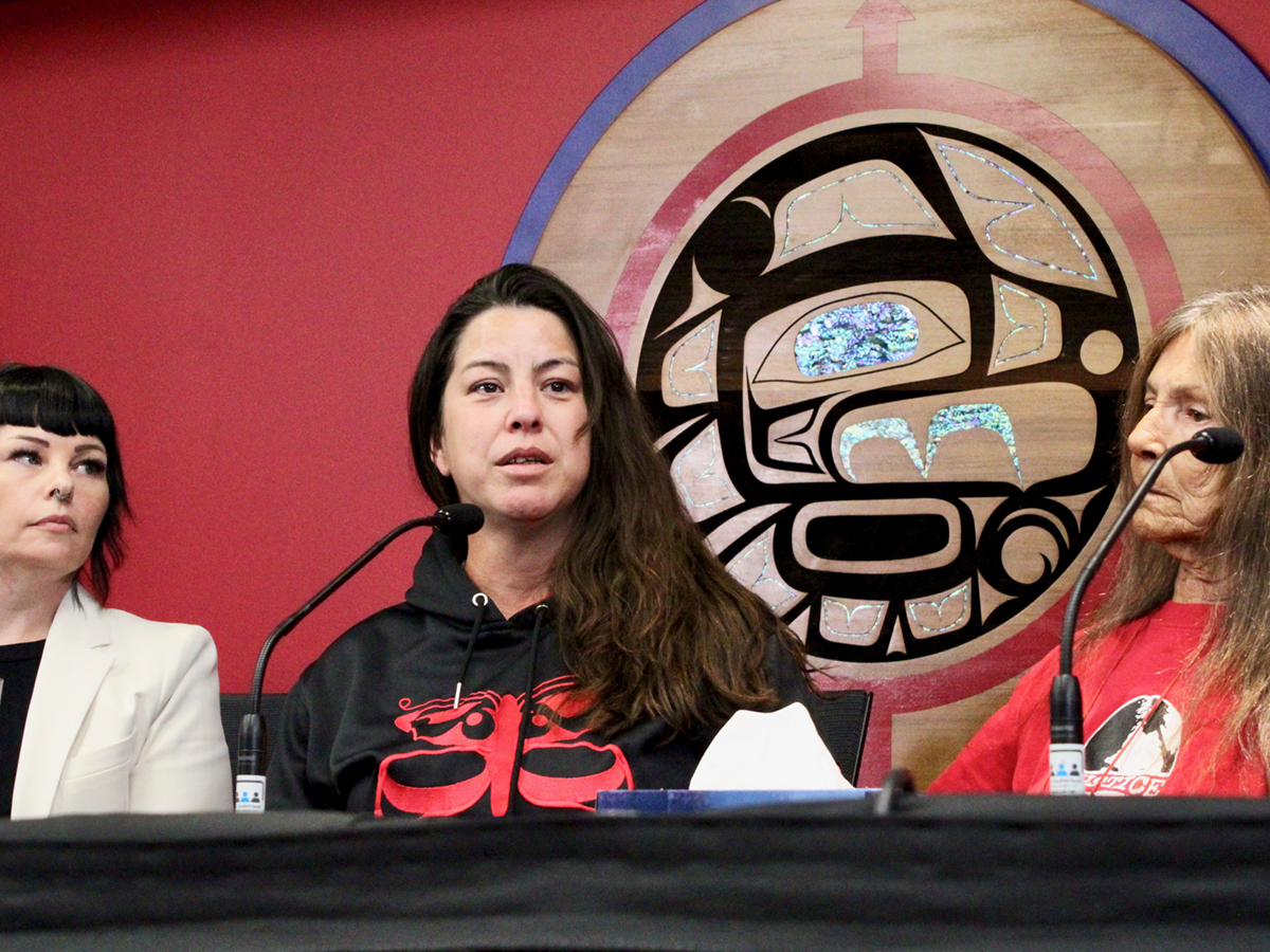 A photo shows three women. 